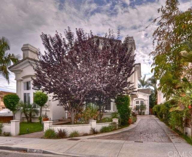 Beautifully landscaped front view.