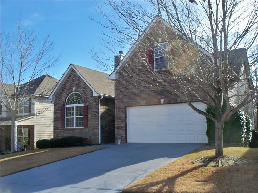 Brick home with new garage door