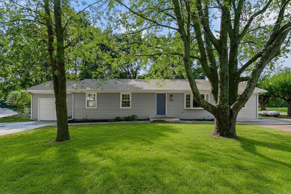 Virtually staged with grass (front yard has recently been seeded)