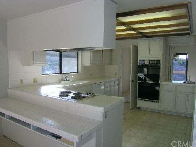 Clean and light kitchen with view