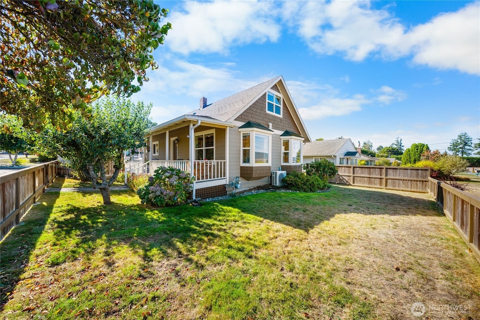 Charming home just one block from the waterfront! Featuring a covered porch, attached garage, and fully fenced yard, this home offers comfort and convenience in a desirable coastal neighborhood.