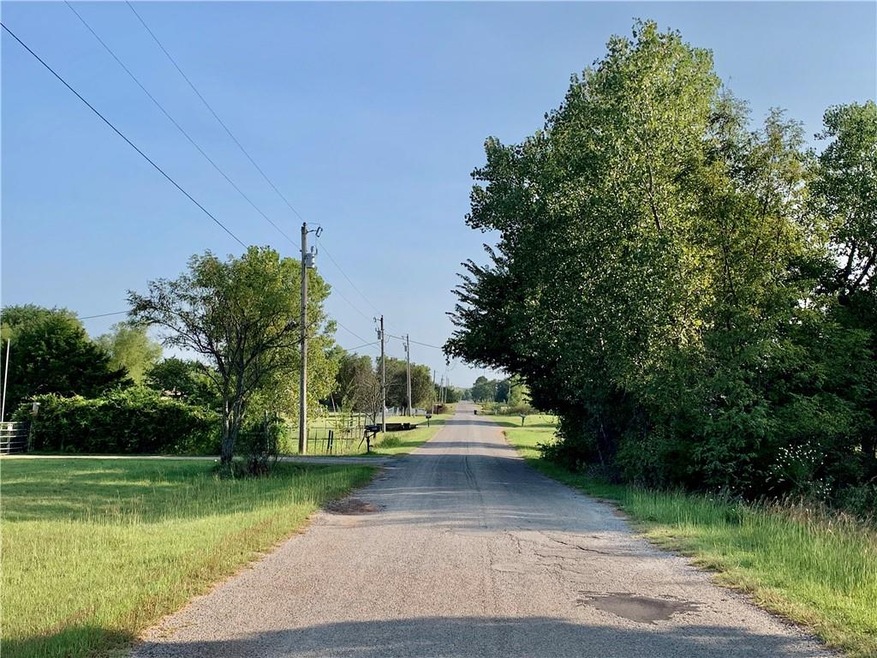 Pretty tree lined street to your peaceful country 