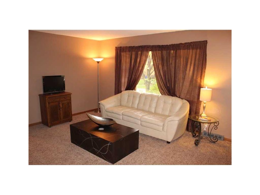 Family Room. New Carpeting Throughout Home.