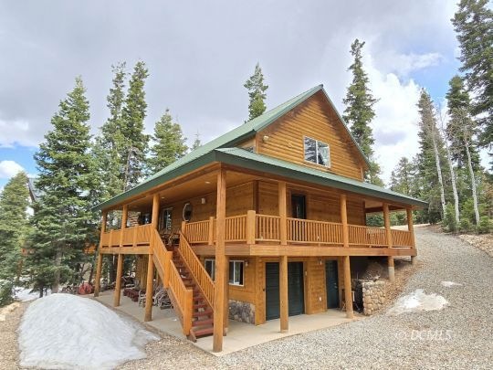 Cabin In The Pine Trees