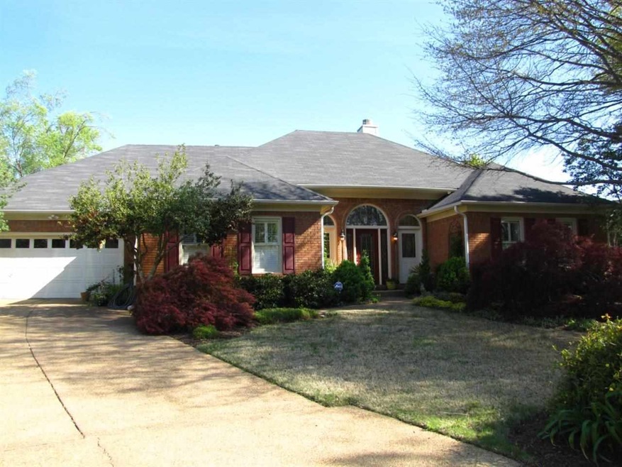 Situated in a quiet cove, this home welcomes you w