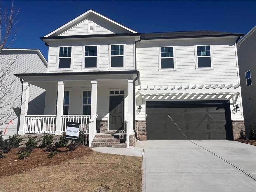 View of front of property with covered porch and a