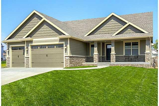 Exterior Front. Photo similar to