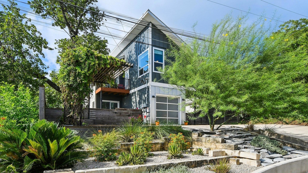 Back of property featuring a balcony