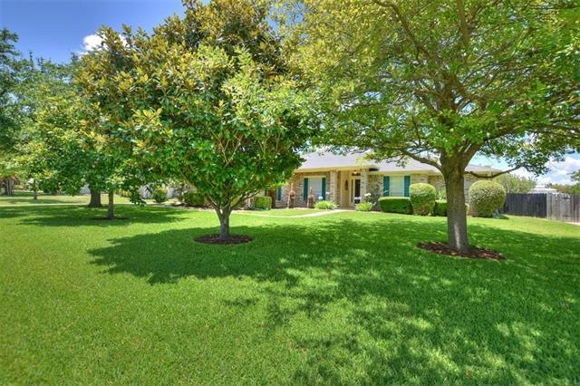 Gorgeous well manicured home on a half acre!!