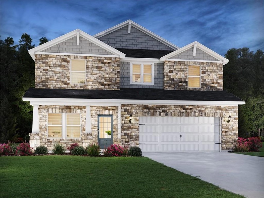 Craftsman-style house with a garage, a front yard,