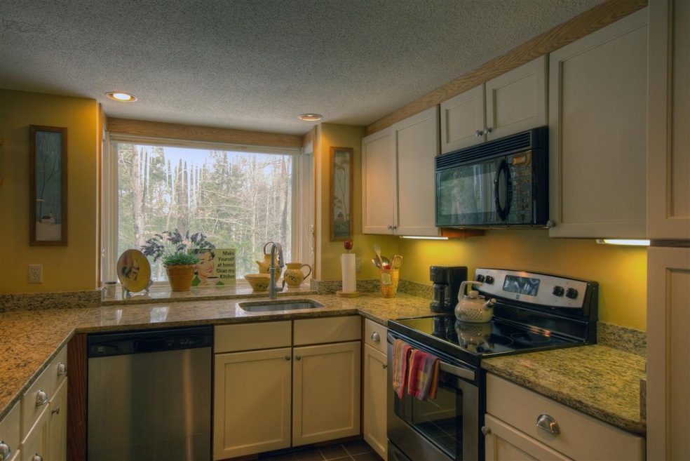 Granite counters, stainless appliances, milk paint