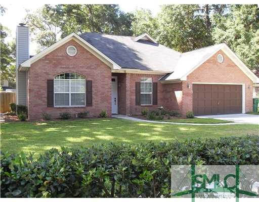 Exterior Front. Brick home with two car garage and