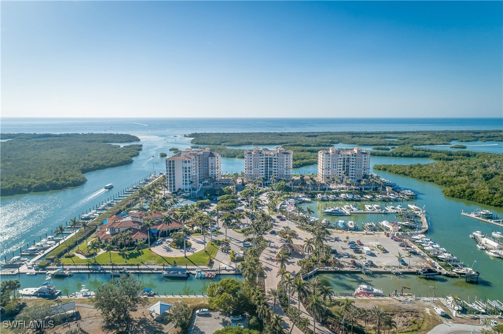 Residences at Pelican Isle Yacht Club unit 504, Naples, FL 34110 - photo 1