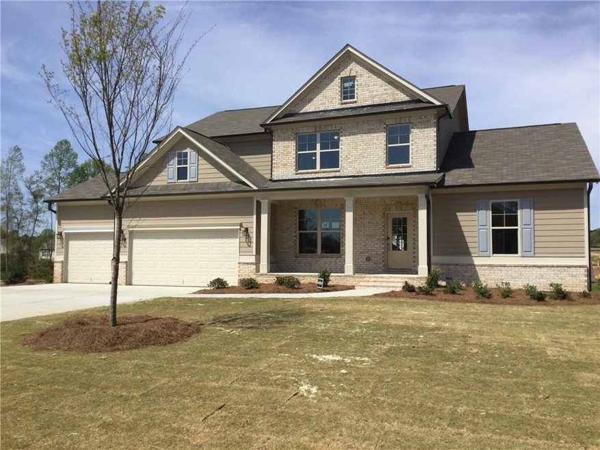 Classic brick and frame home design with rocking c