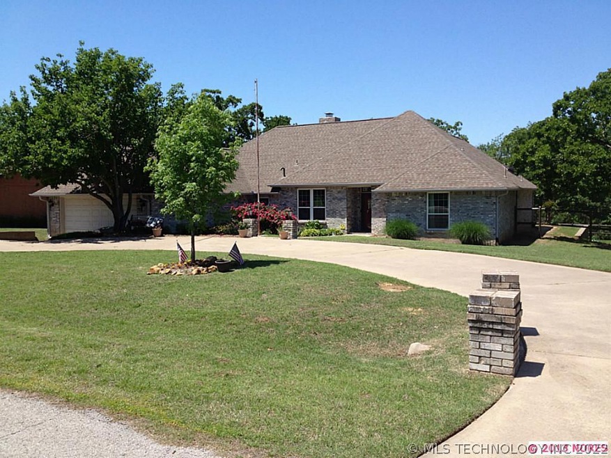 Front of home with circle drive