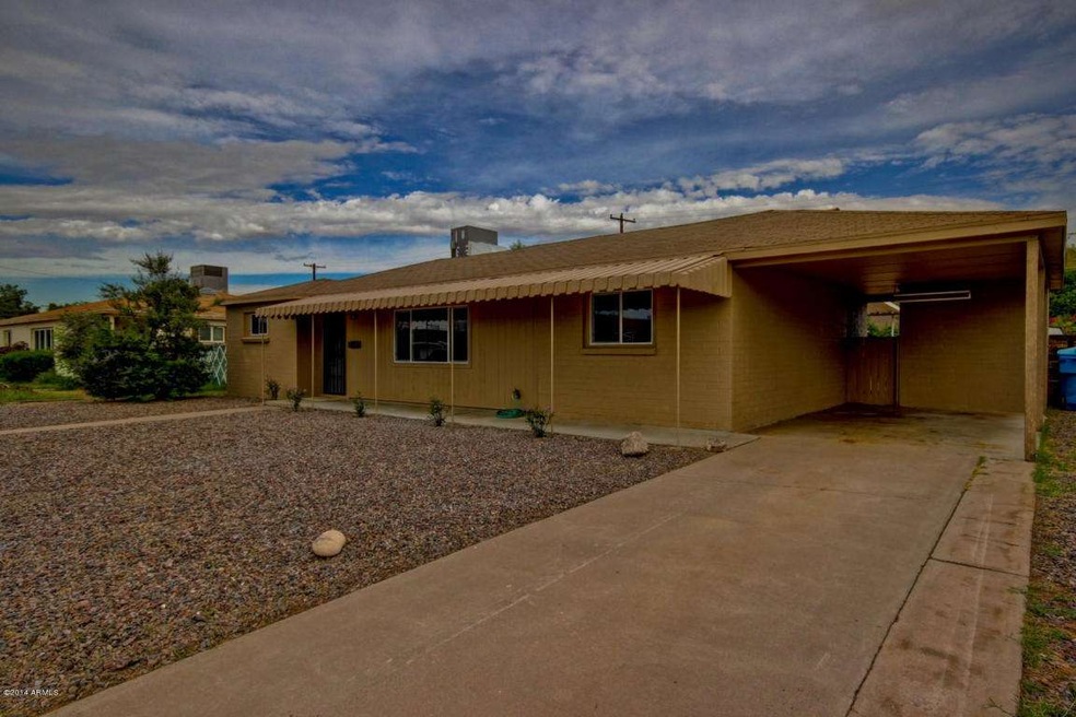 Tons of Parking Plus Carport & storage!