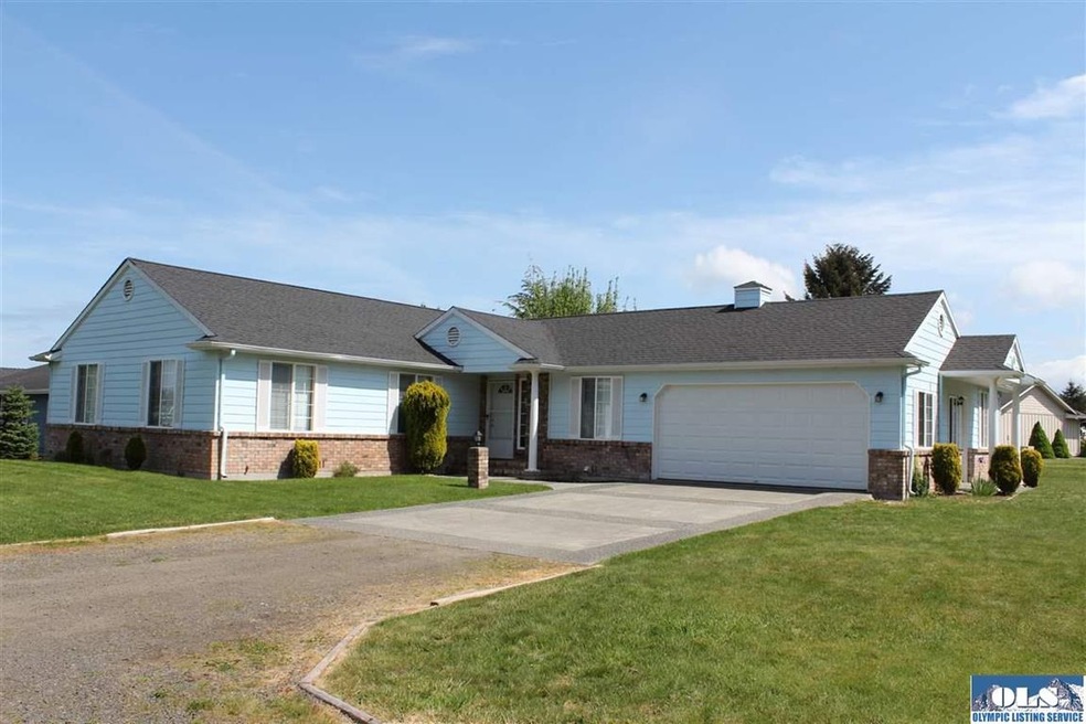 Paved driveway, covered entry