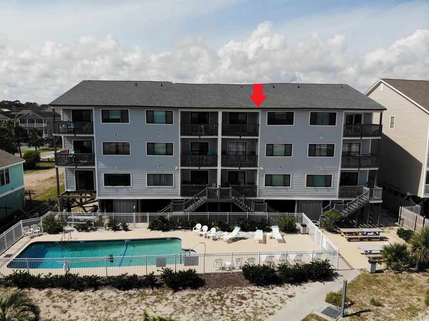 Exterior space featuring a balcony and a community