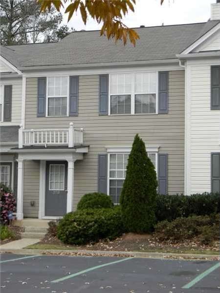 Exterior Front. Attractive interior unit, lush lan