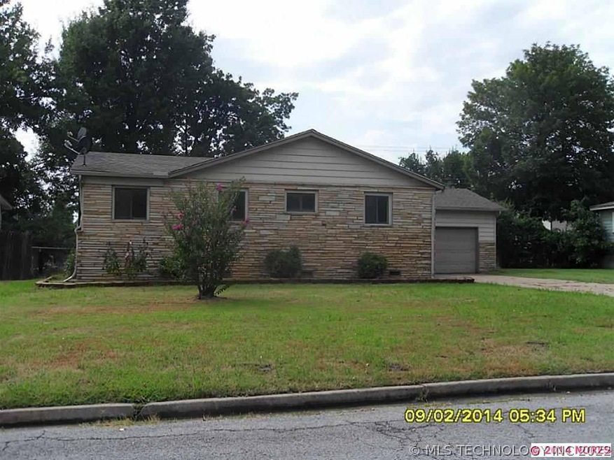 Front with landscaping