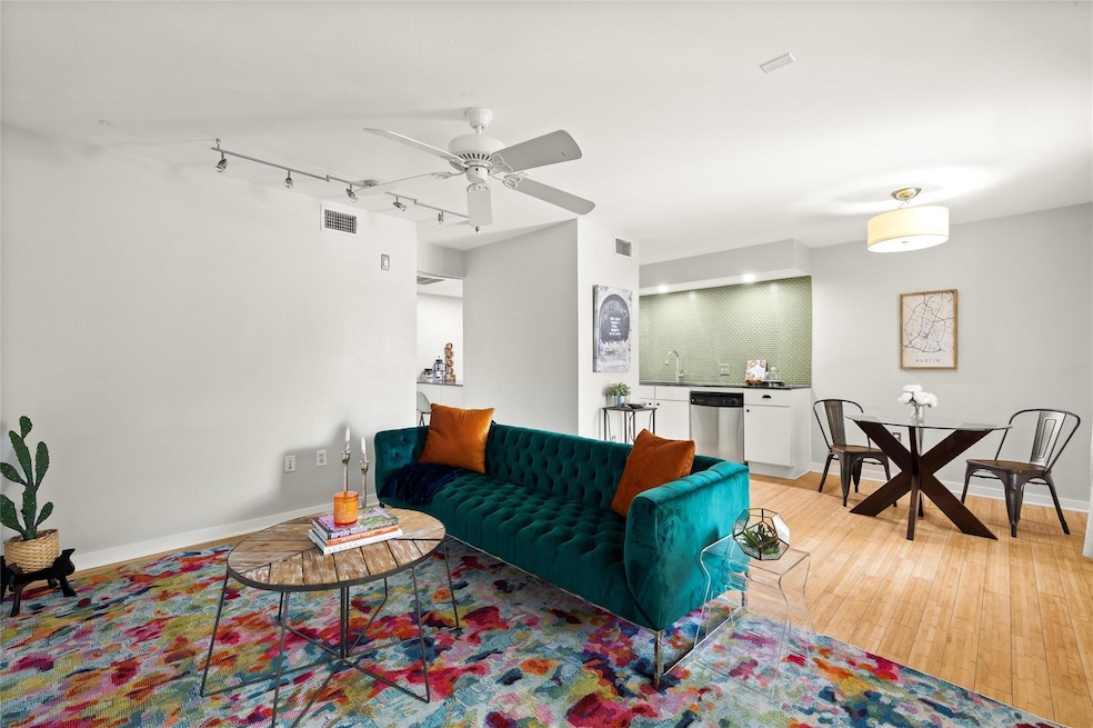 Living area featuring light wood finished floors,