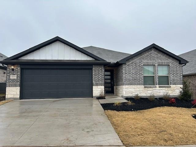 View of front of home with a garage