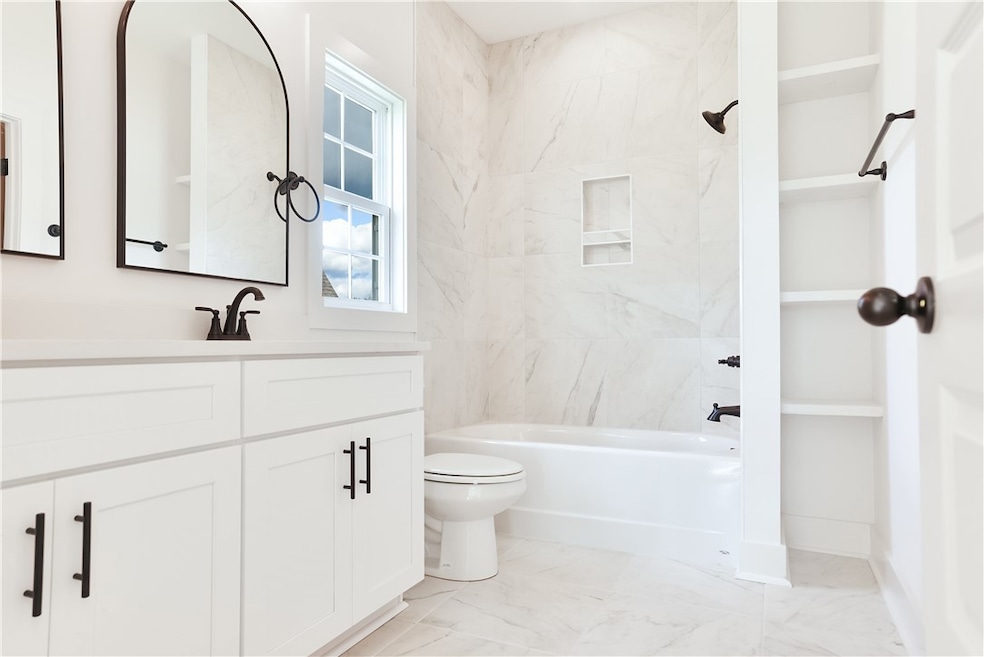 Primary bathroom. Photo is an example of a complet