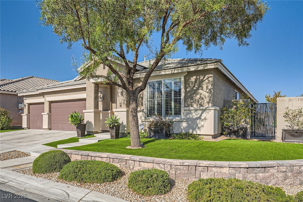 View of front of property featuring an attached ga