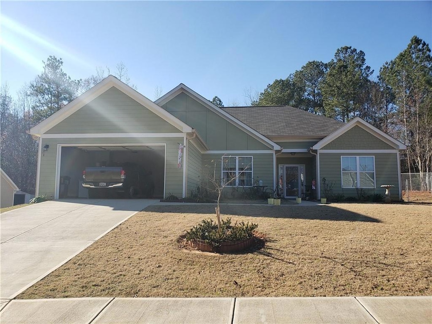 View of front of home featuring a garage