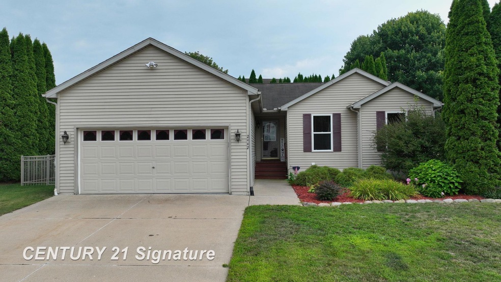 2442 Hickory Circle Dr unit 101, Howell, MI 48855 - photo 1