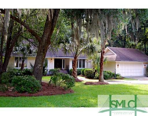 Exterior Front. Nice mature landscaped front yard