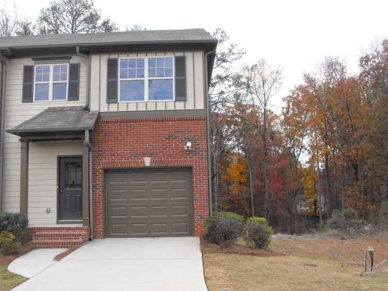 Exterior Front. Great end unit Townhome with brick
