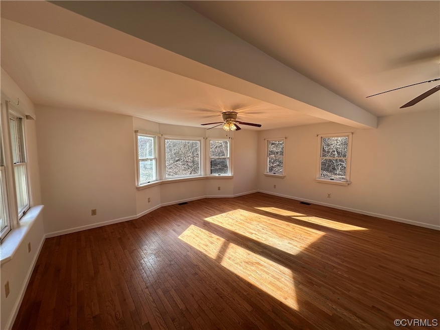 Unfurnished room featuring dark hardwood / wood-st