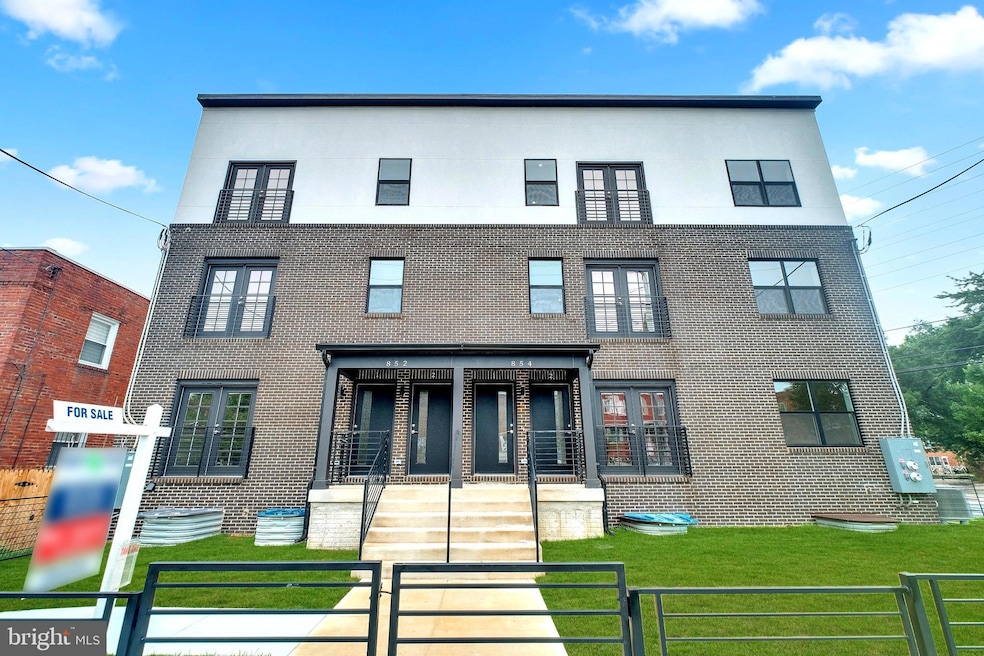 854 Xenia St SE unit 202, Washington, DC 20032 - photo 1
