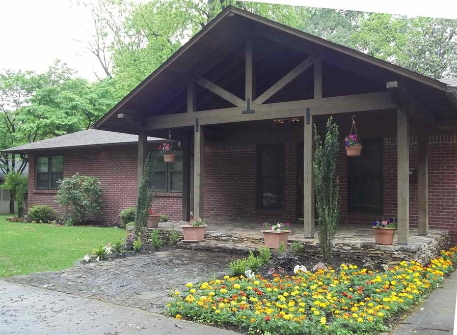 Great Stone Front Porch.  Beautifully Landscaped