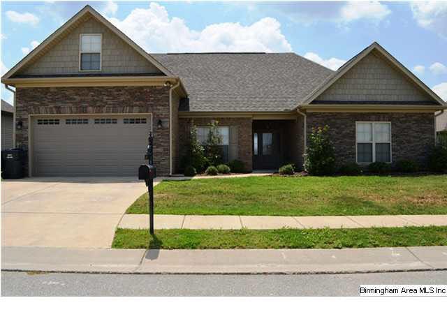 Front View of home with Stone and Brick.  Weeping 
