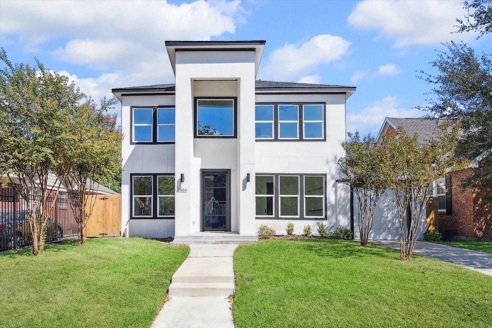 Modern two-story home with a clean, geometric desi