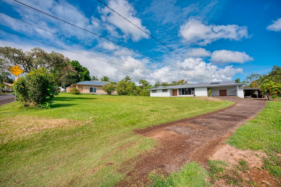 TMK: 3-2-7-24-12/13, MLS: 724785; address: 27-296 and 27-298 Kaieie Road, Papaikou, HI 96781.