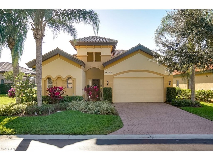 Front with lush landscaping on cul de sac