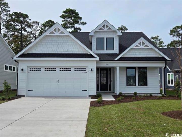 Craftsman inspired home with an attached garage, c