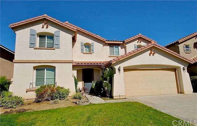 Beautiful Murrieta home with 3 car tandem garage!