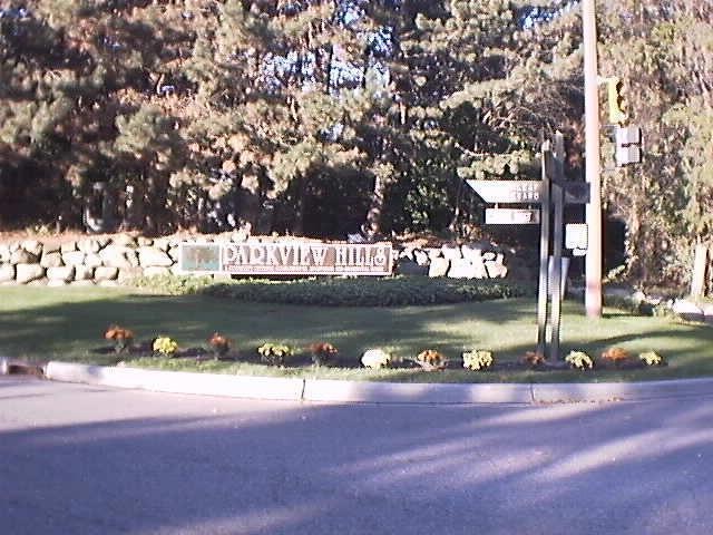 front sign with mums