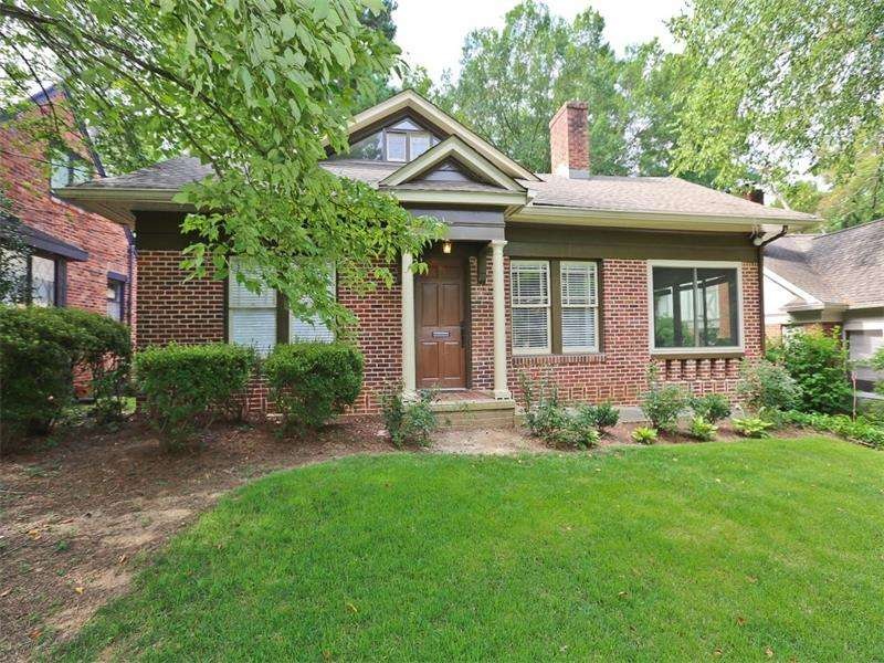 Welcome home to this 1920s brick charmer in the co