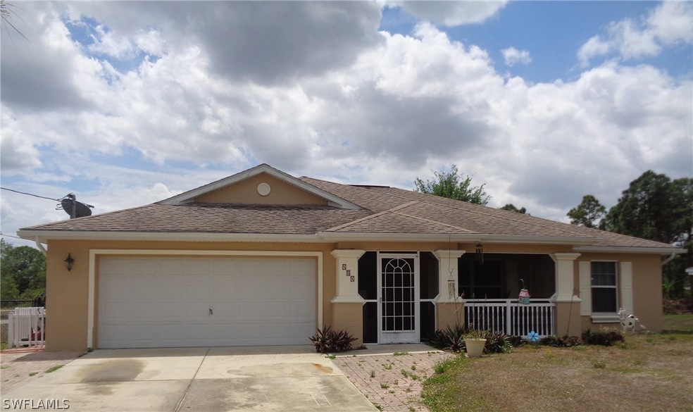 404 Parkdale Blvd, Lehigh Acres, FL 33974 - photo 1
