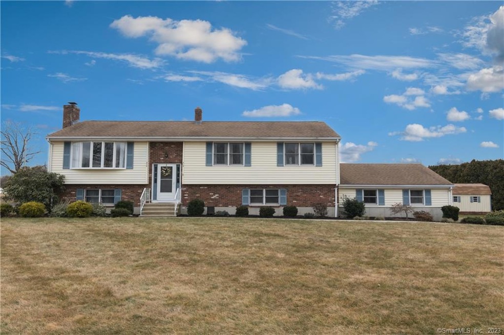 You'll feel welcome from the moment you arrive at this home, situated on a.72 acre corner lot...