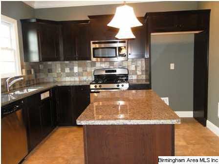 GRANITE, STAINLESS STEEL, AND TILE. PURE LUXURY!!