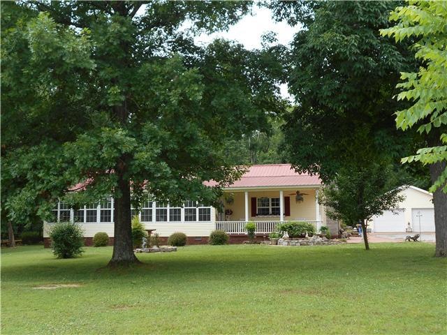 Spacious and charming home on 100 + acres - think great hunting land! 2 4 bedroom perk sites, will divide.