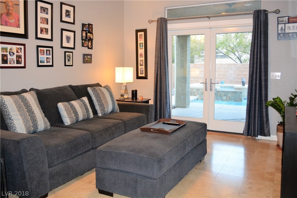 Family room with French doors to covered patio and