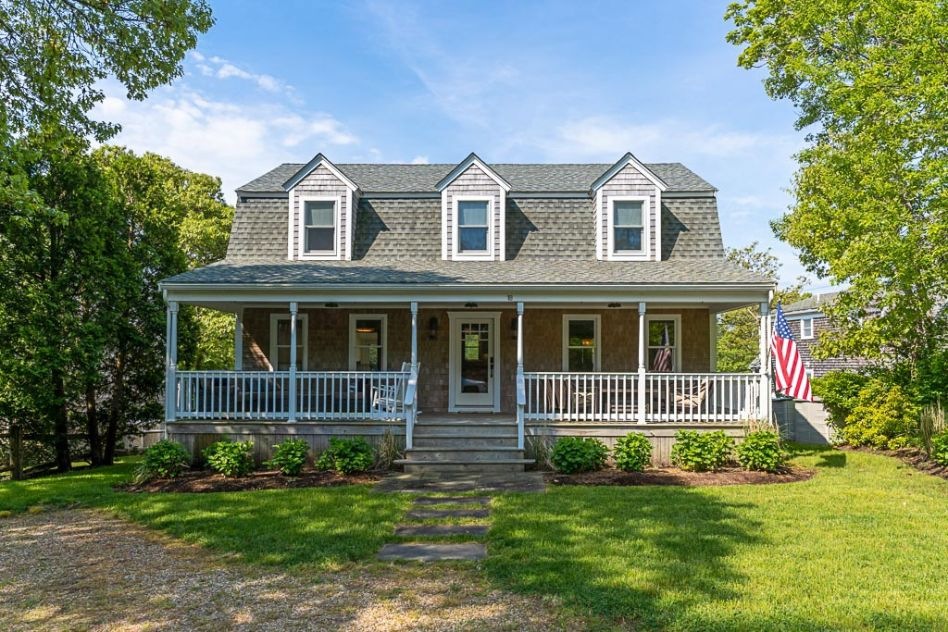 Classic farmers porch on this Gambrell style home.