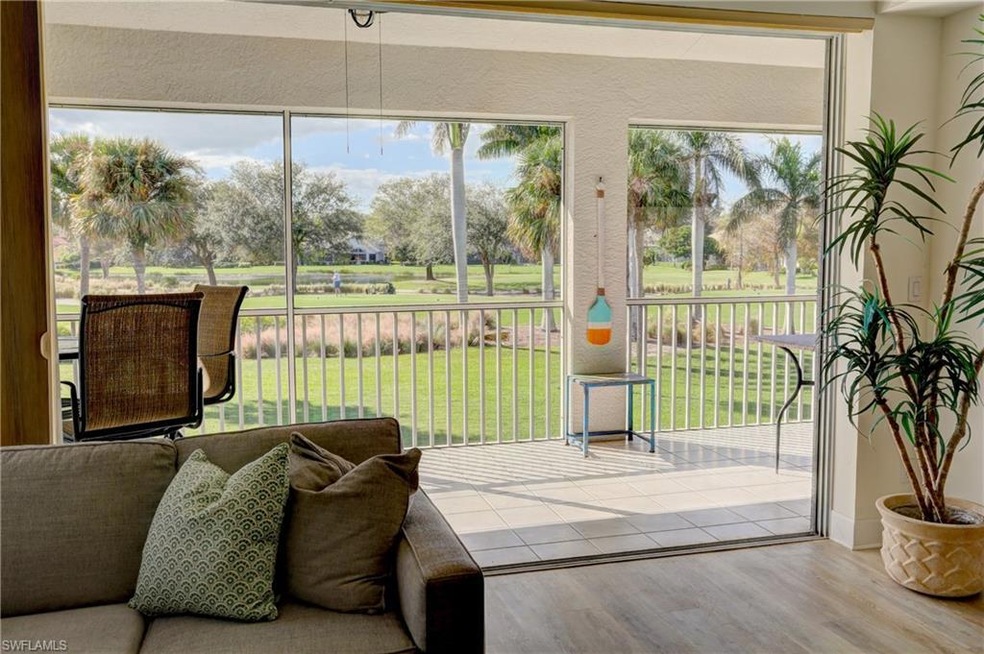 Entryway with hardwood / wood-style flooring and a wealth of natural light
